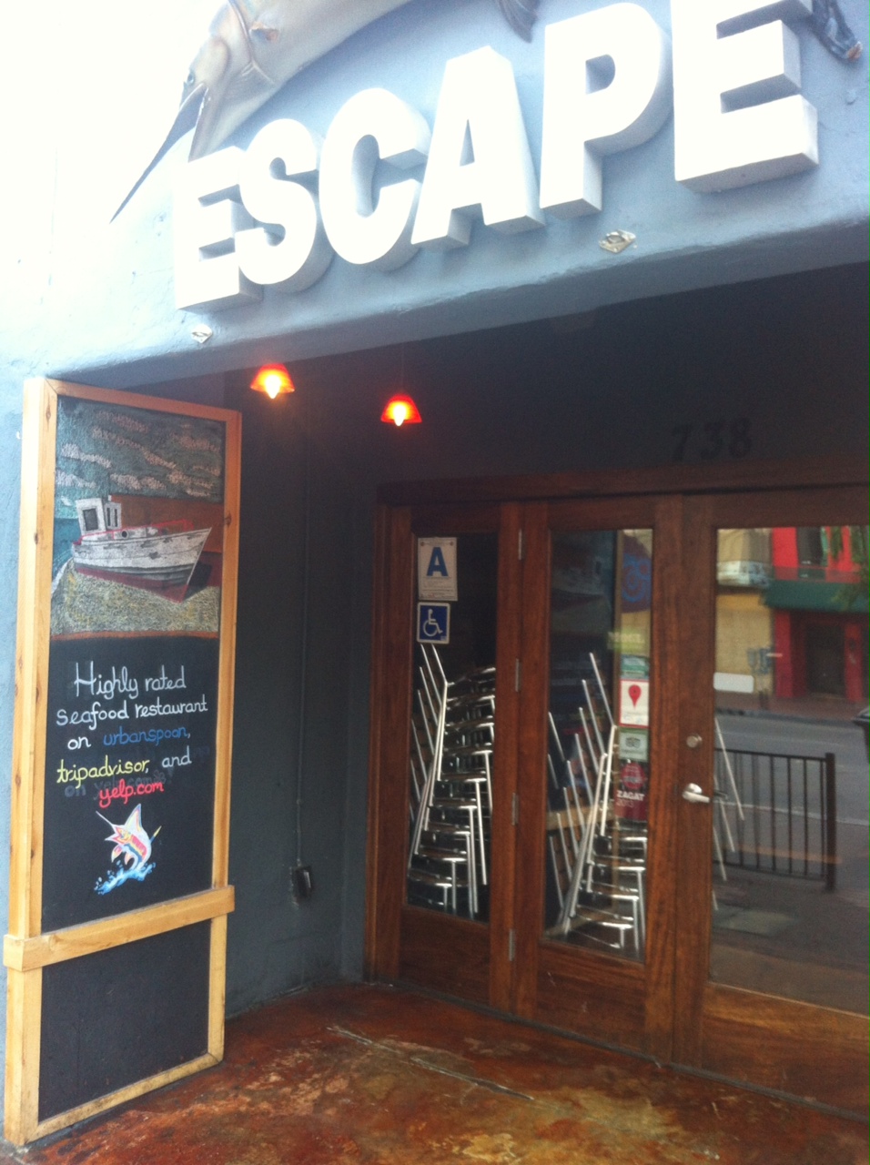 Escape restaurant in San Diego highlights review sites in window... and chalkboard!