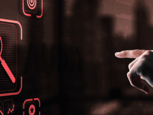 : Main pointant vers des graphiques d'analyse de données holographiques en rouge, représentant l'audit et le suivi stratégique IA